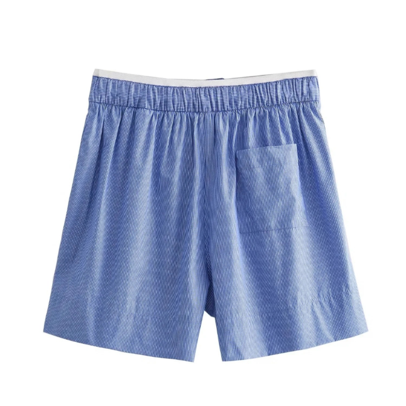 Light blue pinstriped women’s shorts with elastic waistband, button detail & side slits – breathable summer fabric, loose fit.