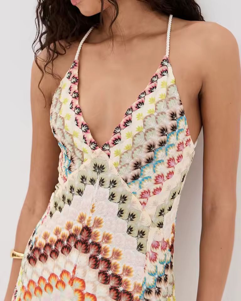 Wild Orchid Dress asymmetrical floral maxi dress with V-neck and colorful pattern, perfect for summer beach look