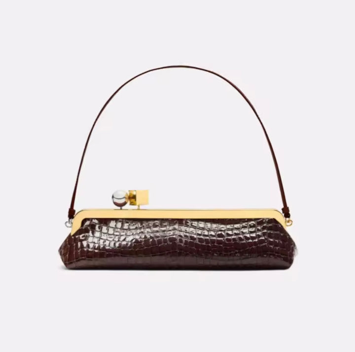Interior of Chic and Charm Golden Clip Baguette Bag – PU leather clutch with polyester lining
