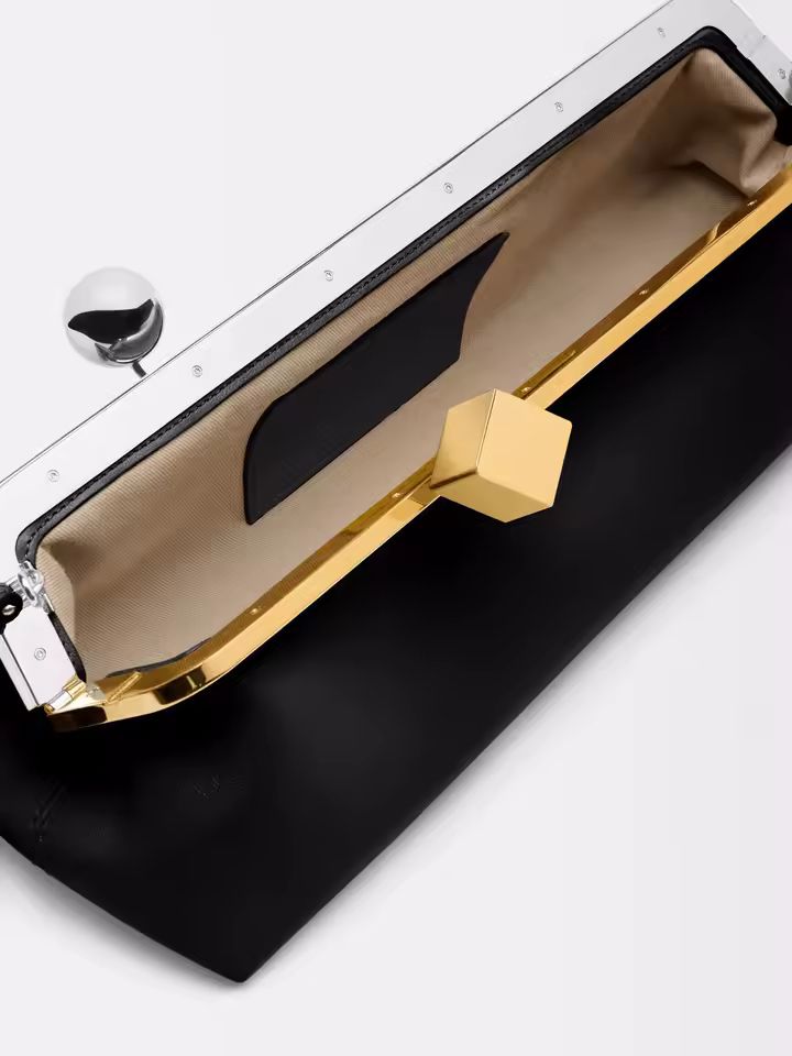 Interior of Chic and Charm Golden Clip Baguette Bag – PU leather clutch with polyester lining