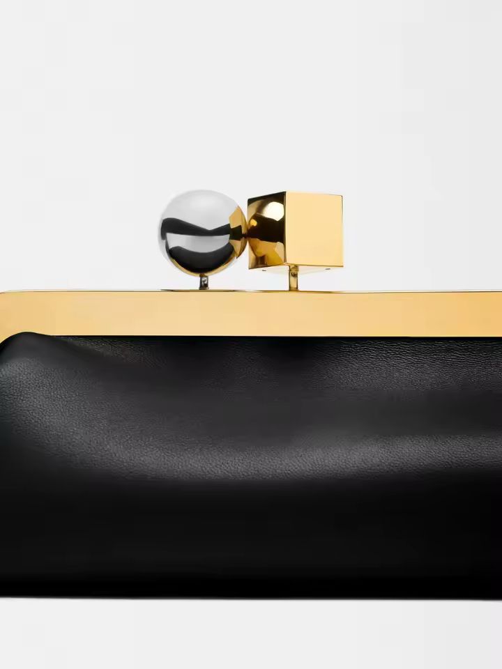 Interior of Chic and Charm Golden Clip Baguette Bag – PU leather clutch with polyester lining