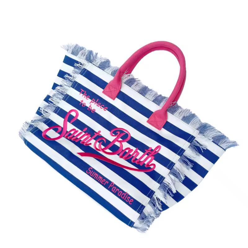 Extra-large Saint Barth canvas beach bag for women with boho fringe and summer script, oversized and handcrafted look.