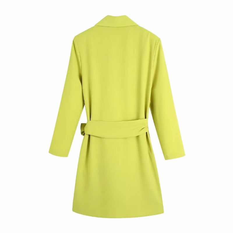 Bright yellow polyester wrap dress with tie waist, perfect for summer days or evening outings.