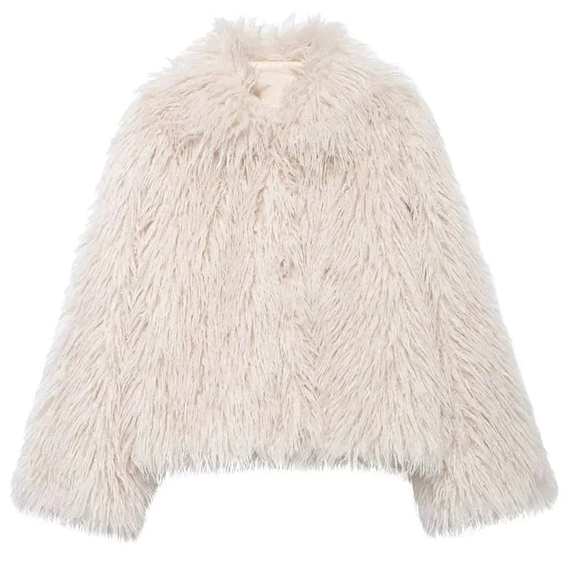 Luxurious faux fur jacket with long sleeves, ideal for evening events. Chic and Charm