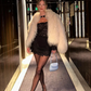 Luxurious faux fur jacket with long sleeves, ideal for evening events. Chic and Charm