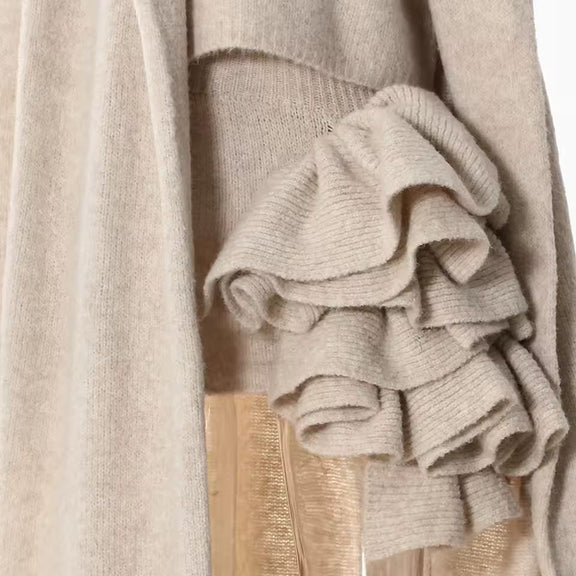 Elegant women’s knitwear set in beige – long wool blend coat, turtleneck sweater and midi skirt with ruffle detail, autumn winter fashion outfit.