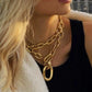 Close-up of Elegant Gold Chain Clasp - Stylish Jewelry Accessory for Women