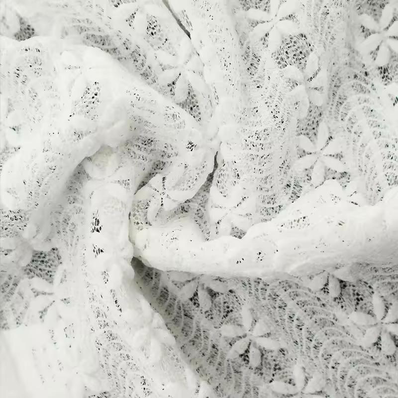 Women’s white lace blouse with wrap tie and slim fit design

