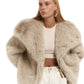 Beige winter jacket with faux fur collar for stylish warmth.