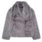 Fashionable gray winter jacket with faux fur collar displayed outdoors.