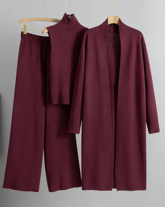 Stylish 3-piece outfit featuring a high-collar cardigan, comfortable V-neck shirt, and flattering high-waisted pants.