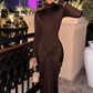 Elegant mocha long sleeve dress with ruched detailing, perfect for sophisticated day and evening wear.