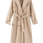 Double-breasted wool coat measuring 38 inches in length, perfect for a stylish layered look.