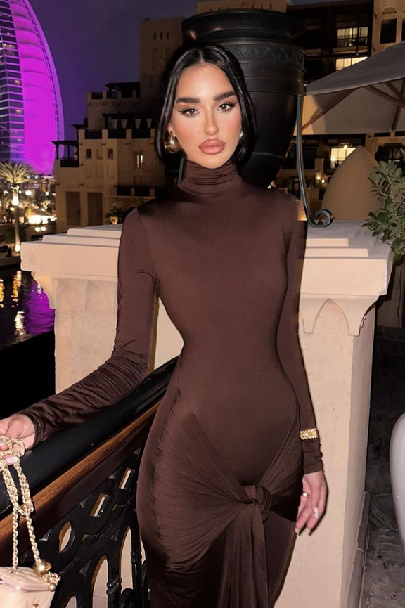 Elegant mocha long sleeve dress with ruched detailing, perfect for sophisticated day and evening wear.