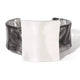 Trendy cuff bracelet displayed on a stylish background, emphasizing its modern aesthetic.