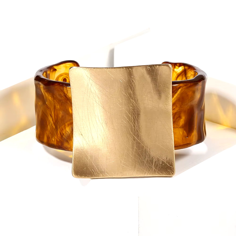 Elegant cuff bracelet for women with a minimalist design, showcasing its refined lines.