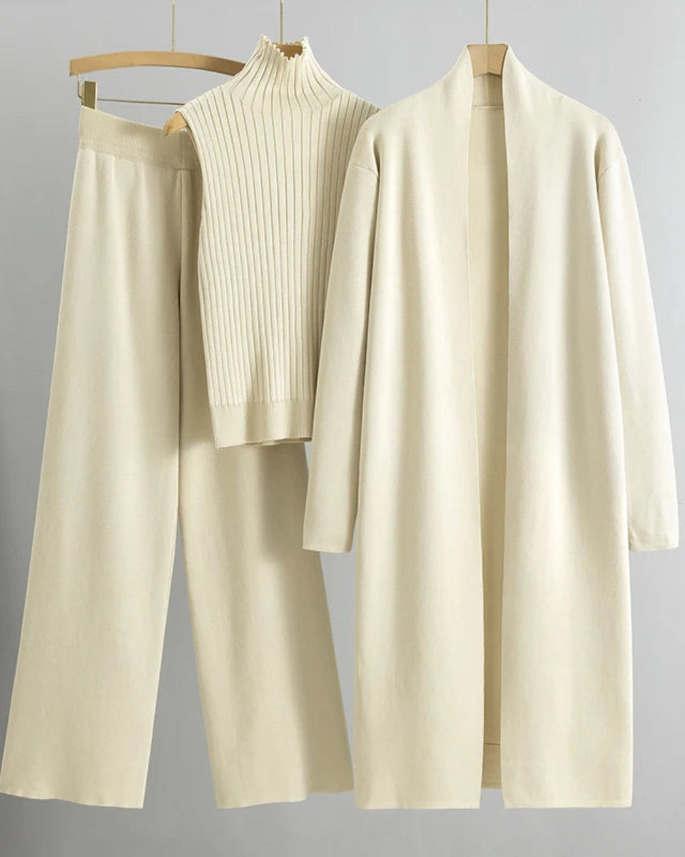 Stylish 3-piece outfit featuring a high-collar cardigan, comfortable V-neck shirt, and flattering high-waisted pants.