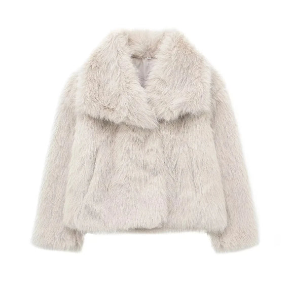 Fashionable white winter jacket with faux fur collar displayed outdoors