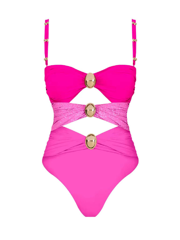 Luxury cut-out one piece swimsuit in bold pink with gold ring details and matching wrap skirt – Chic & Charm beachwear, seamless, wire-free, flattering fit for summer vacation or resort look.