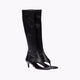Black knee-high stretch sandal boots for women with 7cm kitten heel and open pinch toe, made from vegan PU leather, shown from the side.
