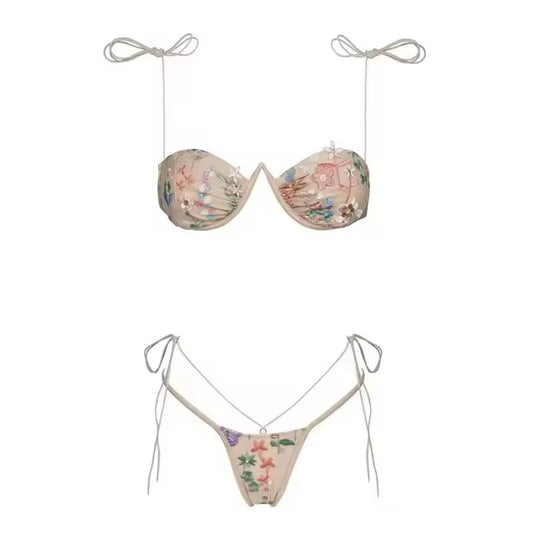 Floral embroidered push-up bikini set with underwire support and micro tie-side bottoms.
