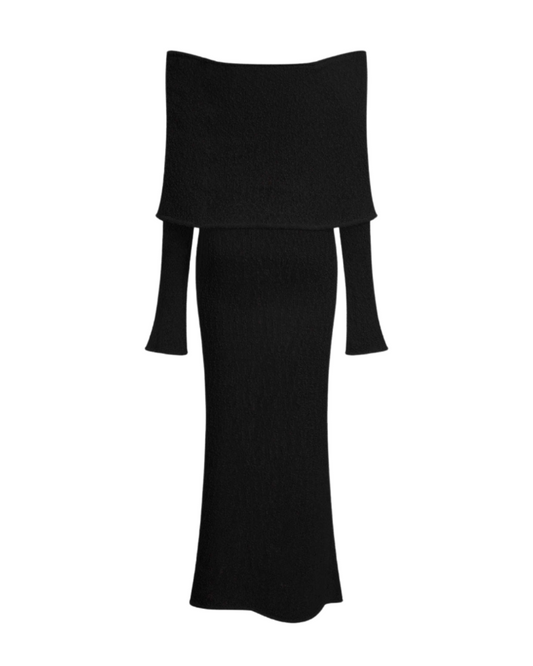 Model wearing Aurora Frame Maxi Dress in black – off-shoulder sculpted knit
