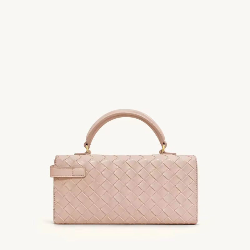 Blush pink designer vegan leather handbag with gold details