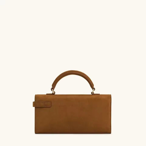 Cognac brown vegan leather handbag with woven texture