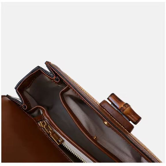 Interior view of Bamboo Grace straw and leather handbag with bamboo handle, showing spacious compartments, hidden coin pocket, phone slot, and zippered section – luxury crossbody bag for women, summer boho purse, eco chic leather bag.
