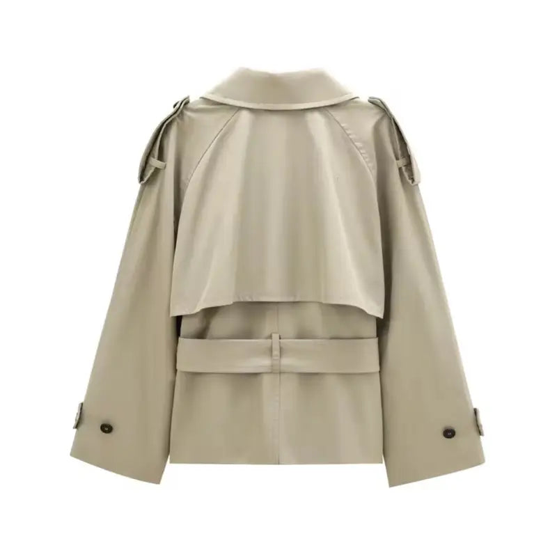 Beige double-breasted coat with black buttons, adjustable belt, and shoulder epaulets, designed for stylish and comfortable wear. Perfect for every occasion, made from high-quality polyester and crafted in Italy.