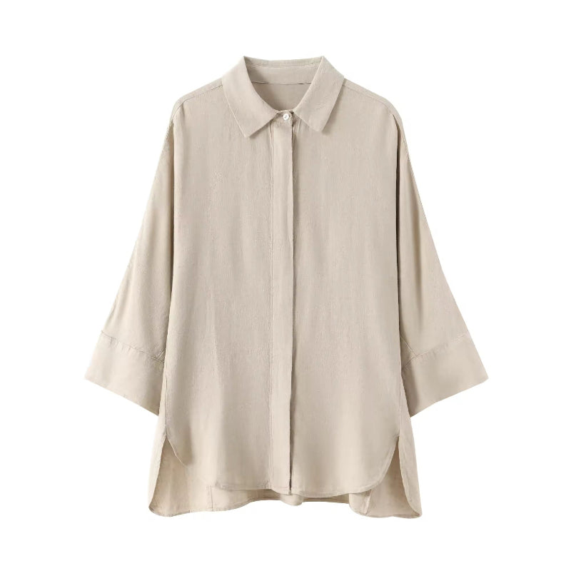 Relaxed-fit beige shirt for women with turn-down collar and 3/4 sleeves – part of coordinated summer set.