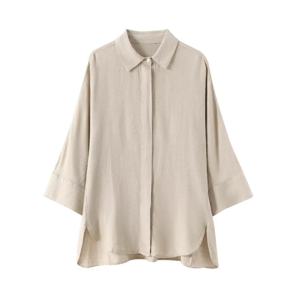 Relaxed-fit beige shirt for women with turn-down collar and 3/4 sleeves – part of coordinated summer set.