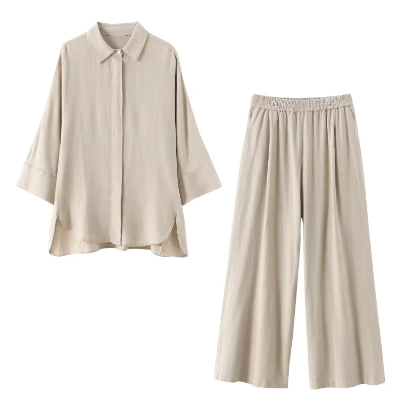 High-waisted wide-leg trousers for women in beige – pleated front with elastic waistband and side pockets, breathable polyester.