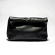 Black genuine leather clutch bag, foldover design, minimalist style with soft touch
