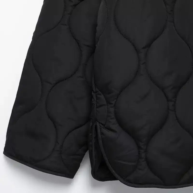 Chic black quilted jacket with customizable ties - outerwear for everyday wear
