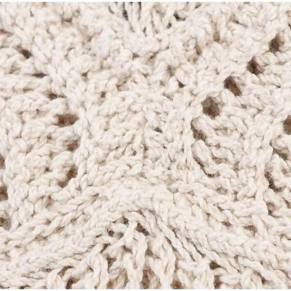 Detailed view of crochet halter neck top with open knit texture – lightweight and breathable summer fashion.