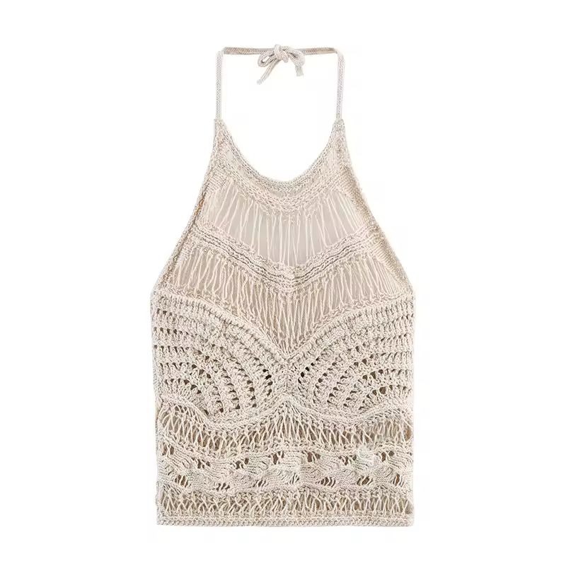Beige crochet halter crop top with boho knit design – backless, sleeveless, perfect for beach and summer outfits.
