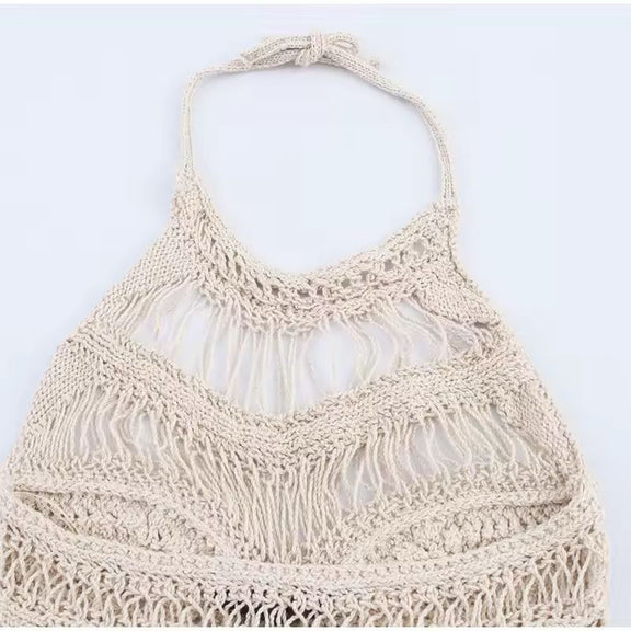 Detailed view of crochet halter neck top with open knit texture – lightweight and breathable summer fashion.