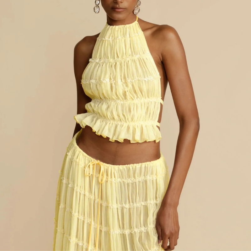 Boho-chic Ibiza dress – 2-piece summer outfit with a flowy pleated maxi skirt and backless halter top, perfect for beach vacations, weddings & festivals.