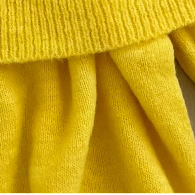 Bright yellow off-shoulder cotton sweater for women, soft and breathable, perfect for spring fashion with a feminine and playful design.