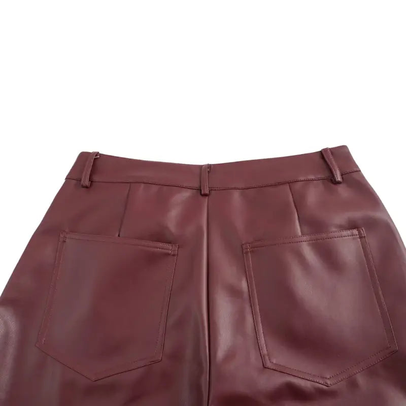 Elegant burgundy faux leather pants, ideal for fashion-forward women seeking comfort and style.