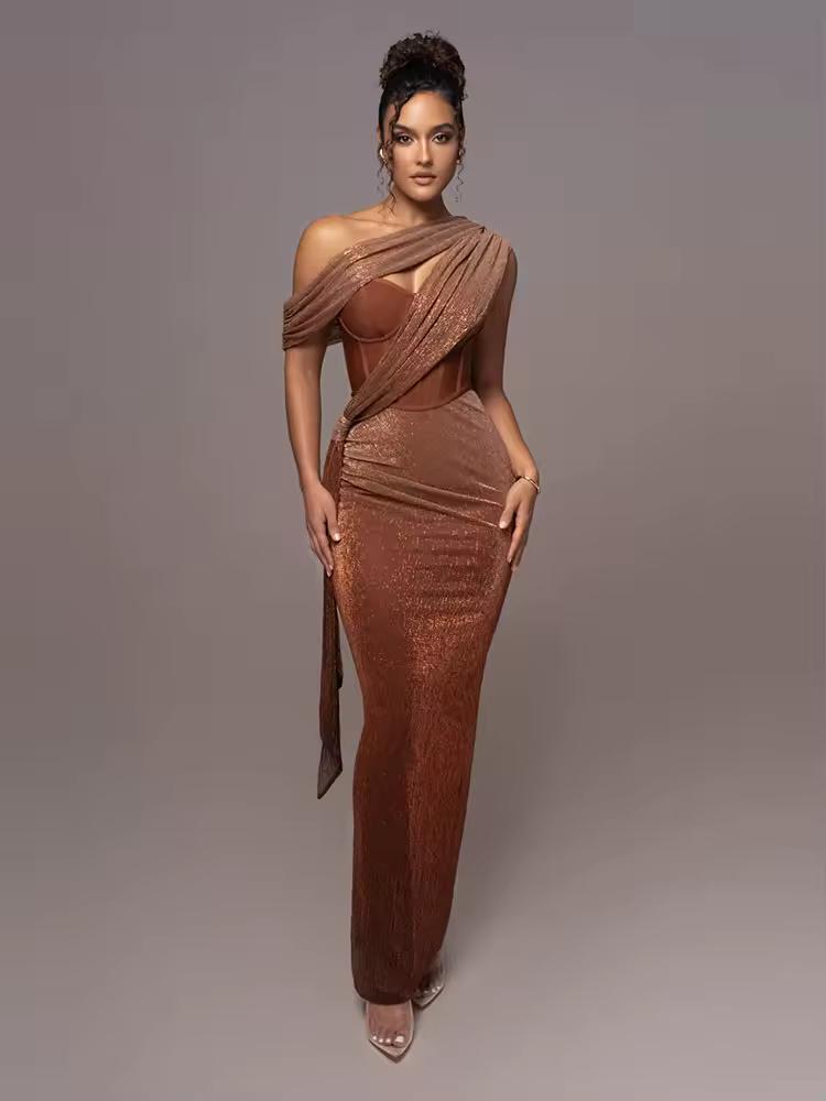 Model wearing CAIRA Gown in Bronze Glow – one shoulder glitter corset gown for evening or wedding
