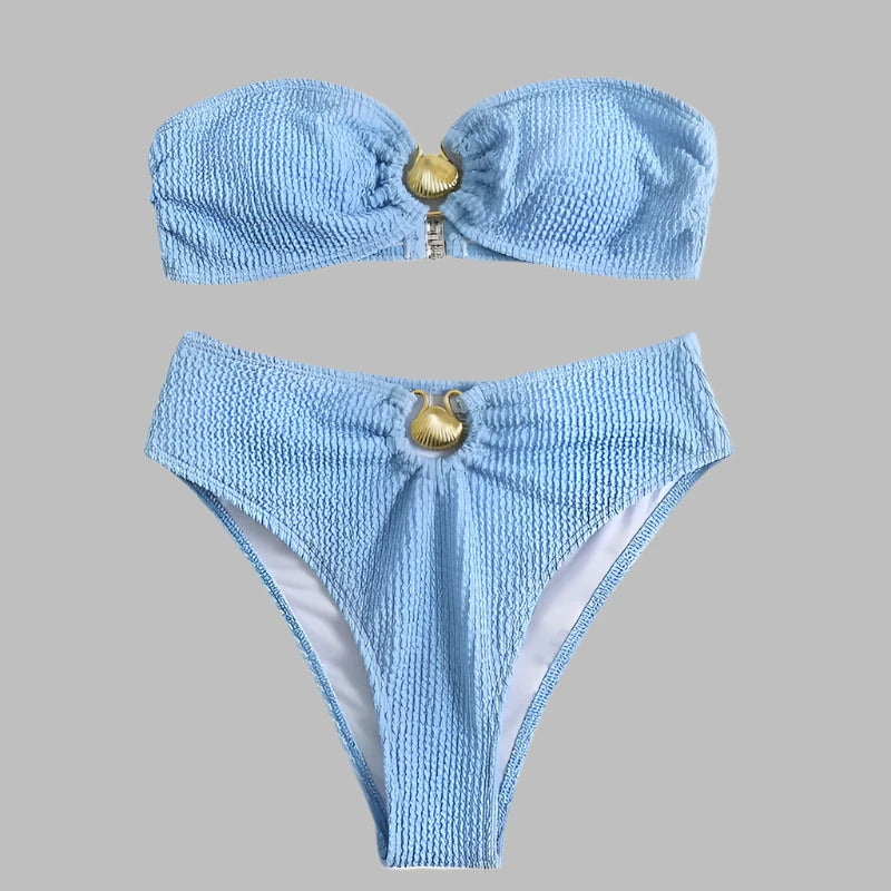 High-waisted blue bikini set with bandeau top and gold centerpiece – Capri Wave Carla.
