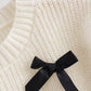 Comfortable loose-fit sweater for casual wear with bow detail