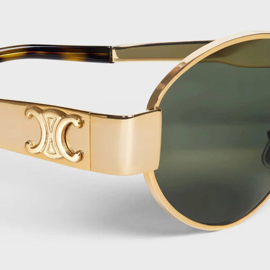 Trendy gold metal frame sunglasses – Ceylie Arc designer oval shades for summer streetstyle 2025