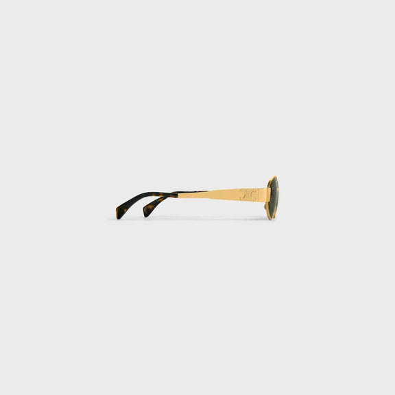 Elegant gold statement sunglasses with green lenses – 925-inspired eyewear trend for summer fashion