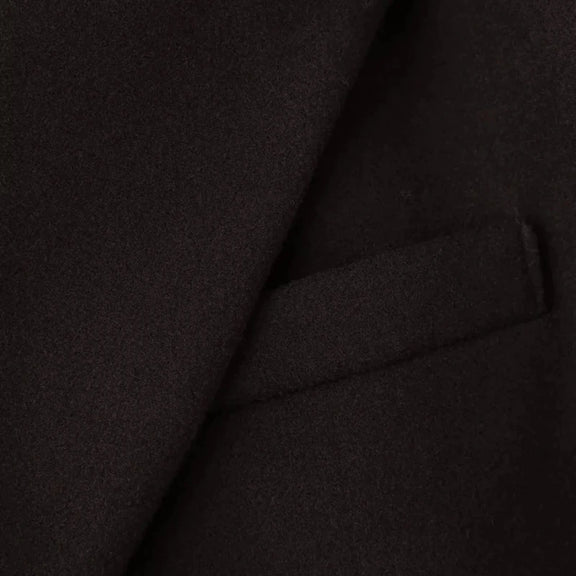 Close-up of Cléa Coat – fringe hem detail on women’s trenchcoat, Chic & Charm fashion