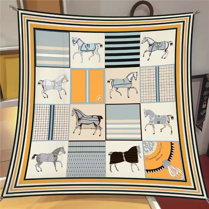Twill silk scarf close-up – premium equestrian print with smooth glossy texture
