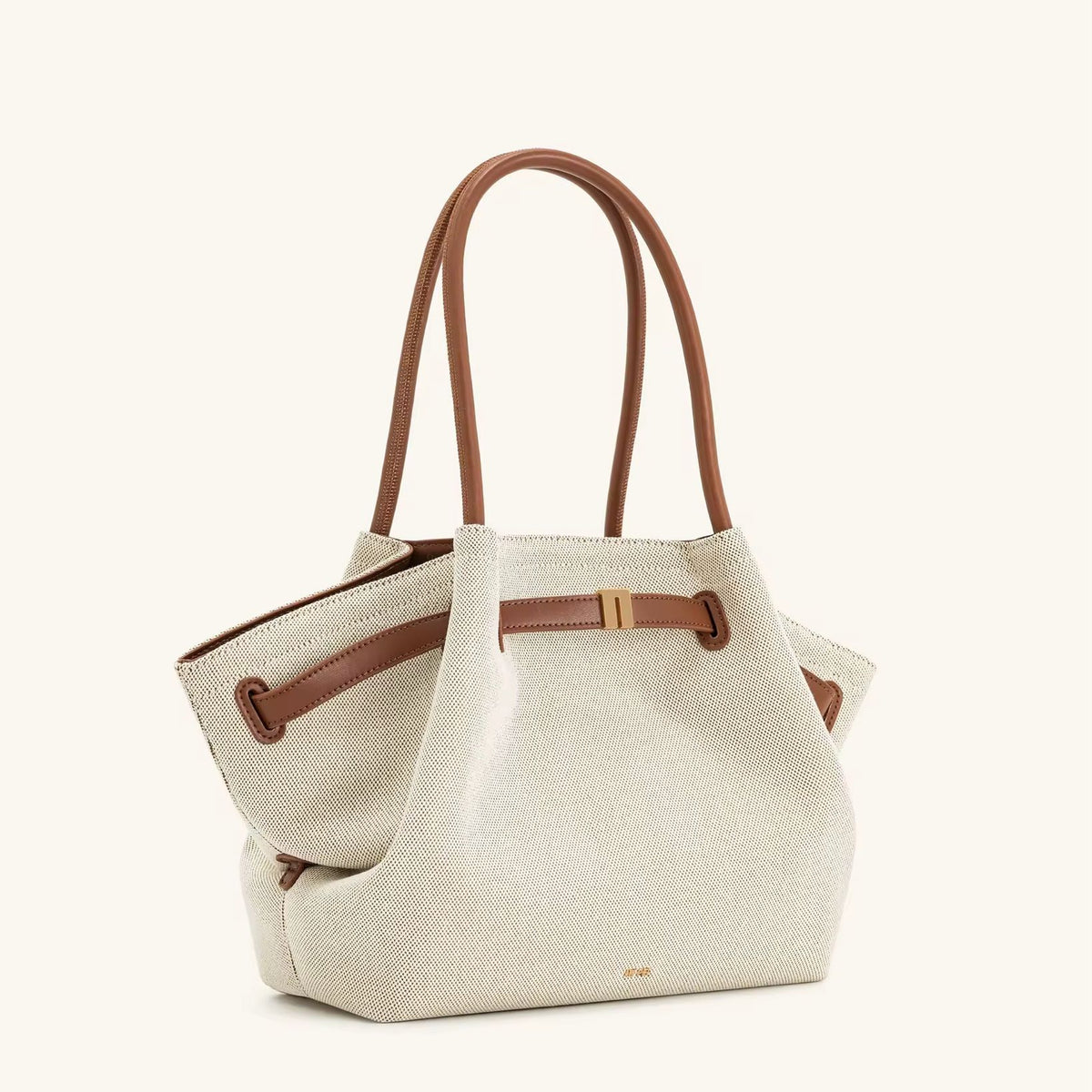 Toscana Tote front view – cream canvas bag with tan leather-look handles
