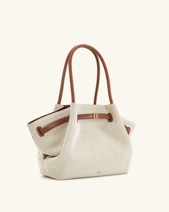 Toscana Tote front view – cream canvas bag with tan leather-look handles

